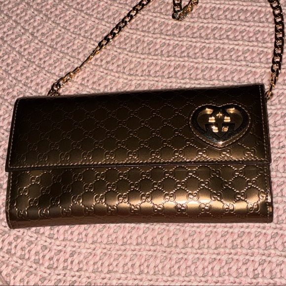 Gucci Handbags - Gucci Metallic Gold Clutch with Chain